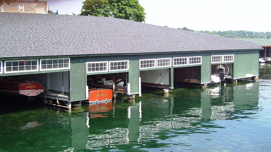 Boat garages on Skaneateles Lake from the village pier
