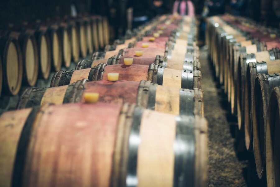 Wine barrels aging in a cellar