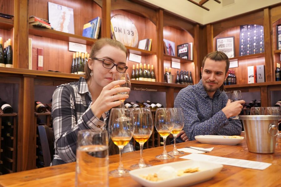 Sheldrake Point lakefront patio with outdoor seating directly on Cayuga Lake