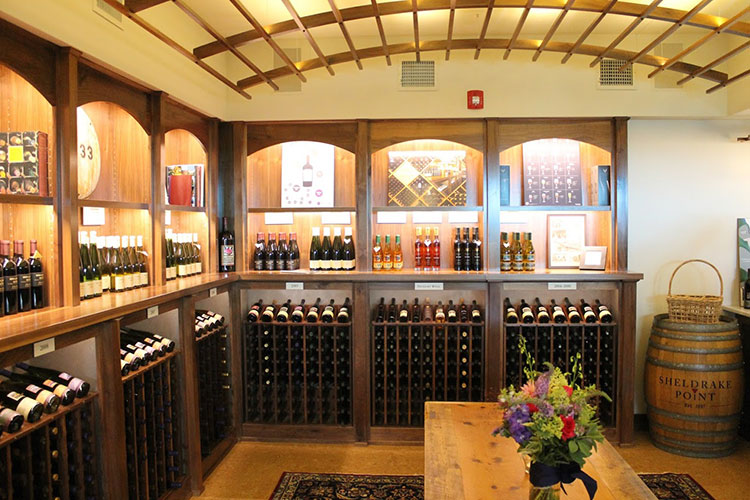 The Vintage Room library tasting space at Sheldrake Point, converted from a 19th-century horse barn