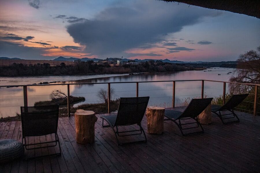 A deck with loungers at sunset, similar to the Vantage Point feel at Wagner
