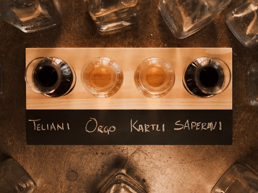 A four-glass wine flight on a board, similar to the standard Wagner walk-in flight