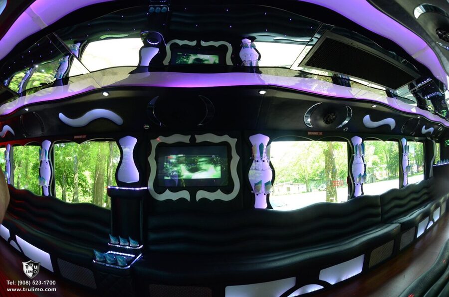 Interior of a party bus showing wraparound seating